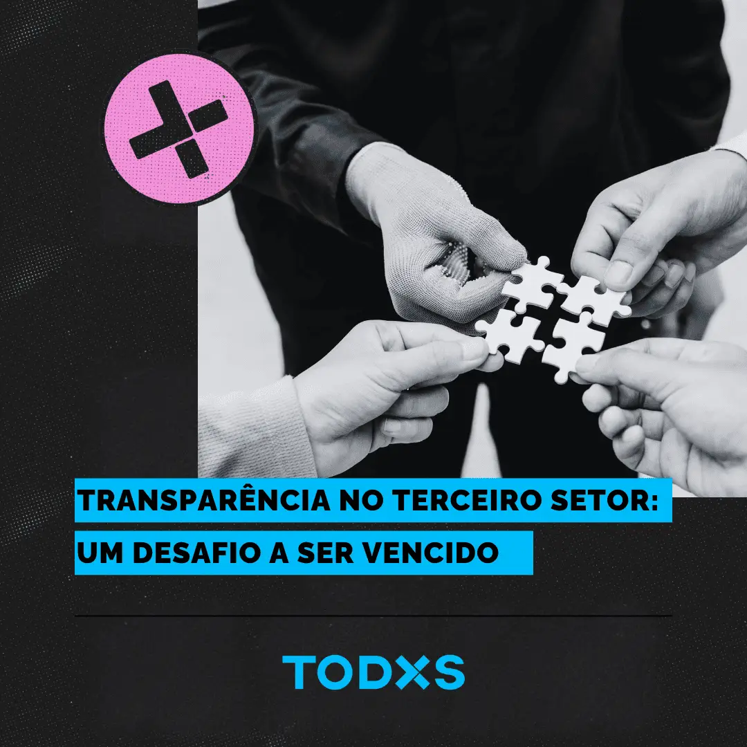 Peças de quebra-cabeça sendo encaixadas por mãos de diferentes pessoas, simbolizando colaboração e inclusão.